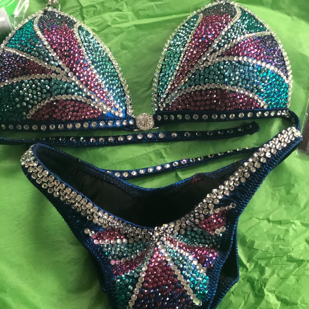 NPC Figure suit- NWOT NEVER WORN